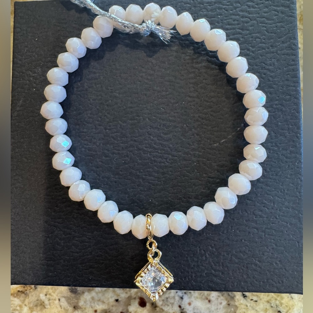 Elegant Beaded Bracelet with Gold Charm